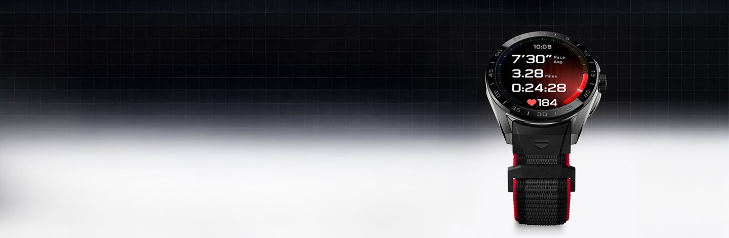 TAG Connected watches over a black and grey background